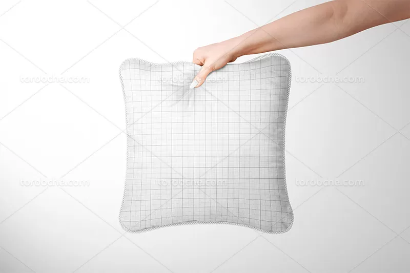 موکاپ لایه باز کوسن مبل در دست