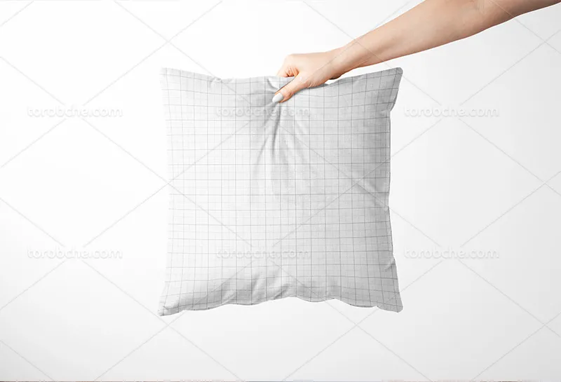 موکاپ PSD کوسن در دست